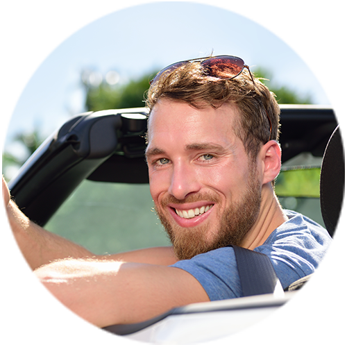 Smiling man while in car